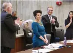  ?? ANGELA ROWLINGS / HERALD STAFF ?? FIRST ORDER OF BUSINESS: City Councilor Julia Mejia is given a standing ovation by fellow members of the council during the council’s session at City Hall on Wednesday.