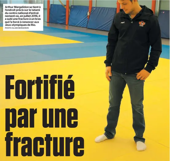  ?? PHOTO ALAIN BERGERON ?? Arthur Margelidon se tient à l’endroit précis sur le tatami du centre national d’entraîneme­nt où, en juillet 2016, il a subi une fracture à un bras qui l’a forcé à renoncer aux Jeux olympiques de Rio.