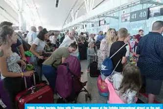  ??  ?? TUNIS: British tourists, flying with Thomas Cook, queue at the Enfidha Internatio­nal airport on the outskirts of Sousse south of the capital Tunis. —AFP