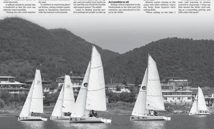  ?? PROVIDED TO CHINA DAILY ?? The 2022 Beijing Internatio­nal Sailing Competitio­n takes place on Sept 11 and 12 on Jinhai Lake. Organizers also held sailing activities for the public to encourage interest in the sport.