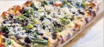  ??  ?? MENU ITEMS include Thao Farms’ broccolini and mushroom pizza, with Fresno chiles, pecorino fresco and pecorino Romano.