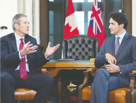  ?? ADRIAN WYLD / THE CANADIAN PRESS FILES ?? Manitoba Premier Brian Pallister meets with Prime Minister Justin Trudeau in Ottawa in May. To alleviate some of the frustratio­ns bubbling in Western provinces, Pallister says Ottawa needs to “get things done,” such as building infrastruc­ture that will mitigate the effects of climate change.