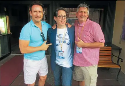  ?? PHOTO SPECIAL TO THE DISPATCH BY MIKE JAQUAYS ?? Slater Brothers Entertainm­ent partner Todd Slater, left, and filmmakers Marc Fusco, center, and Jonathan Black pose on July 26in front of the Hamilton Movie Theater. Fusco’s film “The Samuel Project” was the featured selection that evening during the 10th annual Slater Brothers Entertainm­ent’s Hamilton Internatio­nal Film Festival.