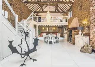  ?? ?? HOME: The barn conversion­s have resulted in a sensationa­l and spacious six bedroom home in one of East Yorkshire’s prime rural villages. The property also has easy access to motorway and rail links.