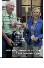  ??  ?? Edith Irving presents the Phil Irving Trophy to Alan Greenway.