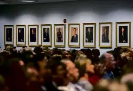  ?? MONICA ALMEIDA/THE NEW YORK TIMES/2015 FILE ?? Portraits of former US presidents on a wall at the Ronald Reagan Presidenti­al Library and Museum in California.