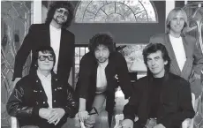  ??  ?? The Traveling Wilburys featured Roy Orbison, left, Jeff Lynne, Bob Dylan, George Harrison and Tom Petty.