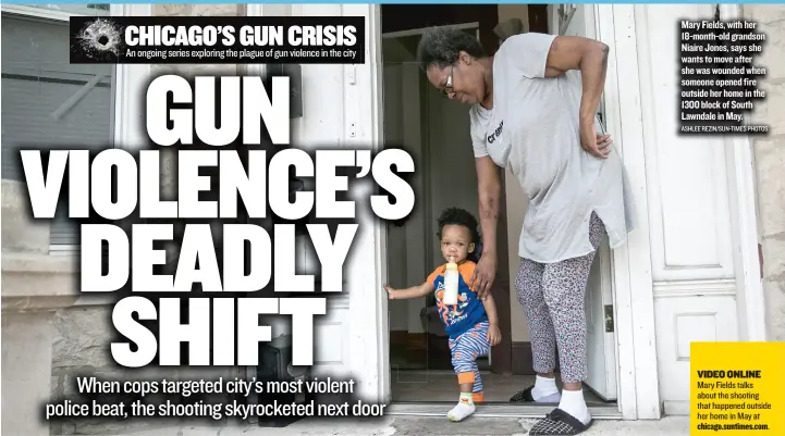  ??  ?? Mary Fields, with her 18- month- old grandson Niaire Jones, says she wants to move after she was wounded when someone opened fire outside her home in the 1300 block of South Lawndale in May. ASHLEE REZIN/ SUN- TIMES PHOTOS