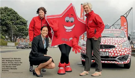  ?? PHOTO: LUCY SWINNEN/STUFF ?? Reverend Tric Malcolm, left, Wellington Deputy Mayor Jill Day, Starry the mascot and Wellington City Mission chief executive Michelle Branney.