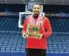  ?? CONTRIBUTE­D ?? Northridge High School varsity basketball coach Jeff Lisath has been awarded the OHSAA Sportsmans­hip, Ethics, and Integrity Award.