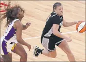  ?? ANTHONY SOUFFLE/STAR TRIBUNE VIA AP ?? Sparks guard Te’a Cooper, left, will miss one game for her part in an altercatio­n with Minnesota on Saturday.