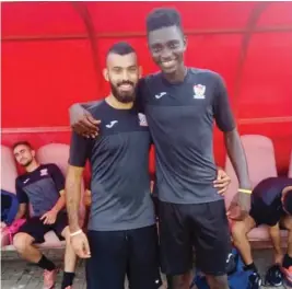  ??  ?? Johnson Nwatu Onyemachi (R) with one of his new team mates in Bnei Sakhnin