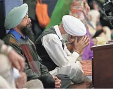  ?? TED S. WARREN, AP ?? Services take place Sunday at the Gurudwara Singh Sabha of Washington, a Sikh temple in Renton, Wash., south of Seattle.