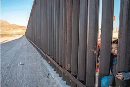  ?? PAUL RATJE/GETTY-AFP ?? The barrier near El Paso, Texas. The Supreme Court ruled that opponents of President Trump’s shift of money for a border wall did not have standing to challenge the transfer.