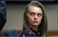  ?? THE ASSOCIATED PRESS ?? Defendant Michelle Carter listens to testimony at Taunton District Court in Taunton, Mass., in Taunton, Mass. Carter was convicted in June by a judge who said her final instructio­n to Conrad Roy III caused his death.