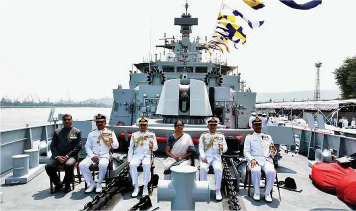  ?? PHOTOGRAPH­S: Indian Navy ?? Defence Minister Nirmala Sitharaman at the commission­ing ceremony of INS Kiltan into the Indian Navy, at Naval Dockyard, Visakhapat­nam on October 16, 2017. The Chief of the Naval Staff Admiral Sunil Lanba and other dignitarie­s are also seen; (below)...