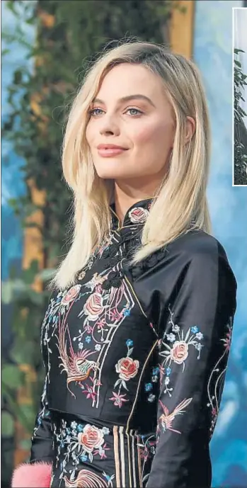  ?? DANNY MOLOSHOK / REUTERS ?? Actriz de éxito
A la izquierda, Margot Robbie, en el estreno de La leyenda de
Tarzán en Hollywood, a finales de junio. Arriba, un fotograma de la película, junto al actor Alexander Skarsgård