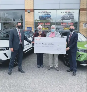  ??  ?? WINNER James Kurd, Mr and Mrs Sadler, and Ian Simpson, branch manager, at Eden Vauxhall