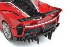  ??  ?? The key change with the “Evo” version of the FXX K was the addition of a fullwidth dual-plane rear wing and shark fin.