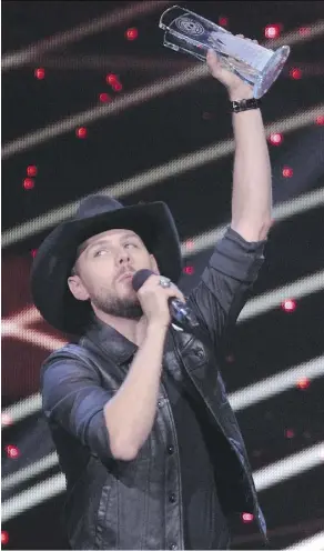  ?? THE CANADIAN PRESS/FILES ?? Brett Kissel won three awards at the Canadian Country Music Associatio­n Awards in London, Ont., in September, including male artist of the year.