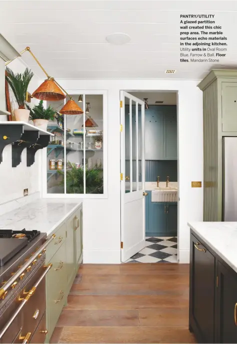  ??  ?? PANTRY/UTILITY A glazed partition wall created this chic prep area. The marble surfaces echo materials in the adjoining kitchen.
Utility units in Oval Room Blue, Farrow & Ball. Floor tiles, Mandarin Stone