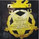  ??  ?? A medal that once belonged to Pfc. Desmond Doss, the heroic subject of the film “Hacksaw Ridge,” is on display at the Medal of Honor Museum.