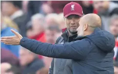  ??  ?? Point made: Pep Guardiola has bitten back after Jurgen Klopp claimed Manchester City could spend £200m every season