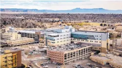  ?? ROBERTO E. ROSALES/JOURNAL ?? University of New Mexico Hospital employees received bills for lab testing that was mandatory before returning to work at the hospital.
