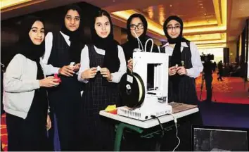  ?? Atiq-Ur-Rehman/Gulf News ?? Students build 3D printer From left: Students Shaikha Mohammad Al Hammadi, Hamda Mohammad Al Hammadi, Sarah Al Zarouni, Roudah Abdullah Al Muaini and Mariam Mohammad Al Ali of Umm Roman School Sharjah with their 3D printer.