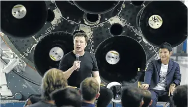  ?? Picture: Bloomberg ?? Elon Musk speaks as Yusaku Maezawa, founder and president of Start Today, looks on at an event at the SpaceX headquarte­rs in Hawthorne, California, this week.