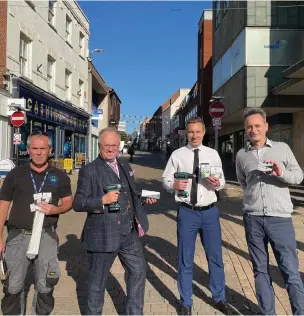  ?? ?? HELPING TO PREVENT CRIME: Rupert Matthews, second left, with Councillor Michael Mullaney, second right, and representa­tives from 24-7 Locks