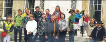  ??  ?? A local group pictured on the steps of Annes Grove House following the announceme­nt of the take-over of the estate by the Board of Works in 2017.