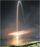  ?? Photo / AP ?? A time exposure shows the Delta IV lifting off at the Kennedy Space Centre, Cape Canaveral, Florida.