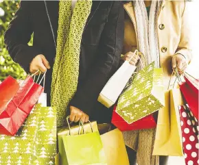  ?? GETTY IMAGES ?? It seems we can’t get enough of Christmas music. In a survey of more than 1,500 Canadians, 80 per cent said festive tunes add to their shopping experience.