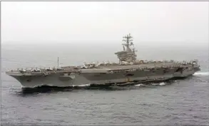  ??  ?? The Associated Press
The aircraft carrier USS Nimitz transits the Arabian Sea. The Pentagon announced Thursday, Dec. 31, that the USS Nimitz, the only Navy aircraft carrier operating in the Middle East, will return home to the U.S. West Coast.