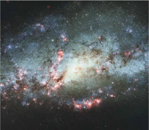  ??  ?? Vue de la galaxie NGC 4490 grâce au téléscope Hubble ESA HUBBLE AGENCE FRANCE-PRESSE