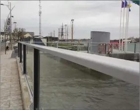  ??  ?? The new glass flood wall along New Ross Quay.