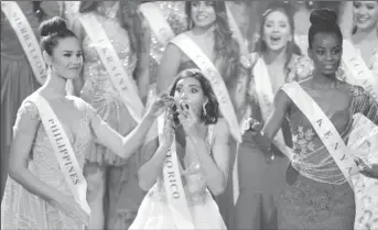  ??  ?? Stephanie del Valle Díaz was clearly shocked as she realised she had won the 2016 Miss World pageant (Reuters photo)