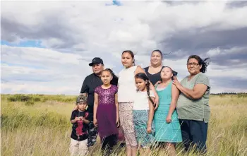  ?? TAILYR IRVINE/THE NEW YORK TIMES ?? Relatives of Allison Highwolf, who died under suspicious circumstan­ces in 2015, including her four daughters and her mother, Pauline, outside their home last month on the Northern Cheyenne Reservatio­n in Montana.