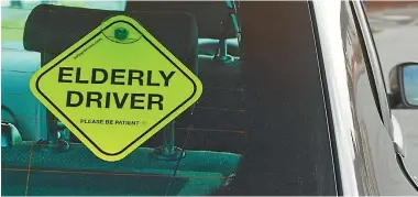  ??  ?? Nick Carrol, of SafeGranni­es, says his company’s E-plates have been selling well. They retail for $12 each and one couple bought four.