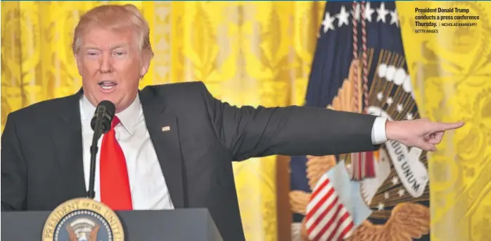  ??  ?? President Donald Trump conducts a press conference Thursday.
| NICHOLAS KAMM/ AFP/ GETTY IMAGES