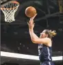  ?? Chris Szagola / Associated Press ?? UConn’s Katie Lou Samuelson shoots during the second half of the Huskies’ 88-67 victory on Saturday in Philadelph­ia.