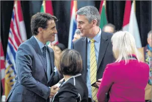  ?? CP PHOTO ?? Prime Minister Justin Trudeau shakes hands with Nova Scotia Premier Stephen McNeil before the First Ministers meeting in Ottawa Tuesday.