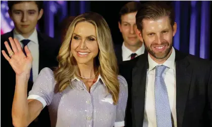  ?? Photograph: Jonathan Ernst/Reuters ?? Lara and Eric Trump at former president Donald Trump’s campaign launch at Mar-a-Lago. Australian mining billionair­e Gina Rinehart was seen in the background of a photo he posted to Instagram.