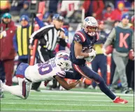  ?? Steven Senne / Associated Press ?? Buffalo Bills cornerback Dane Jackson (30) tackles New England Patriots wide receiver Jakobi Meyers during the second half on Sunday in Foxborough, Mass.