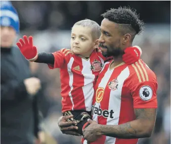  ??  ?? Bradley Lowery with Jermain Defoe during the striker’s time with Sunderland.