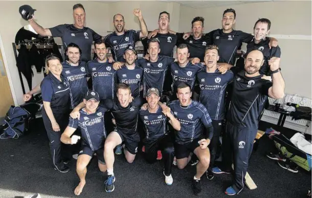  ??  ?? WE’VE DONE IT: Scotland’s cricketers celebrate victory against Sri Lanka at Beckenham yesterday