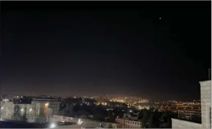  ?? SAM MEDNICK/THE ASSOCIATED PRESS ?? Intercepto­r missiles are launched into the sky in Jerusalem early Sunday.