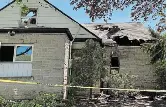  ?? CELESTE PERCYBEAUR­EGARD/ THE HAMILTON SPECTATOR ?? Police tape surrounds 52 Mountain Brow Blvd. after it was damaged in an overnight fire.