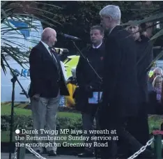  ??  ?? Derek Twigg MP lays a wreath at the Remembranc­e Sunday service at the cenotaph on Greenway Road
